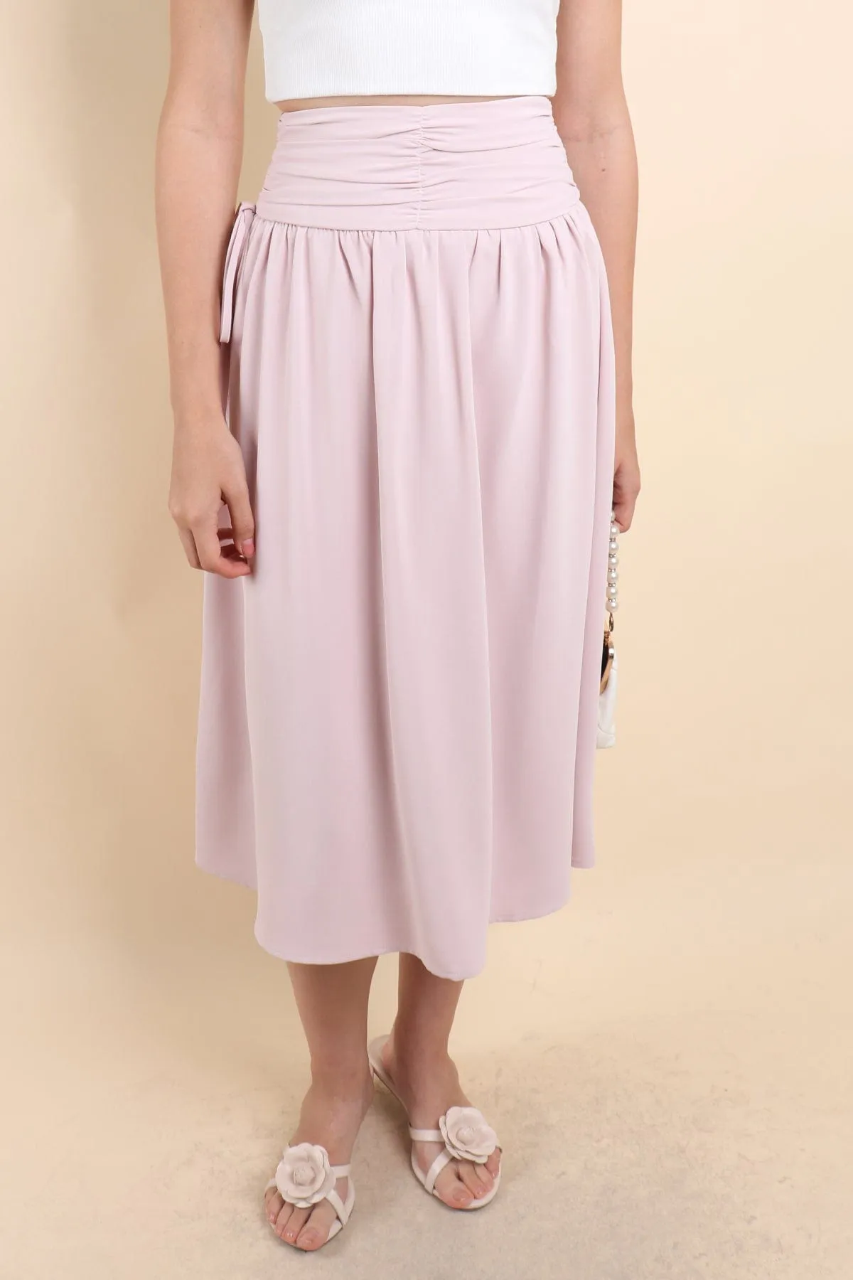 ADORA RUCHED MIDI SKIRT IN PINK