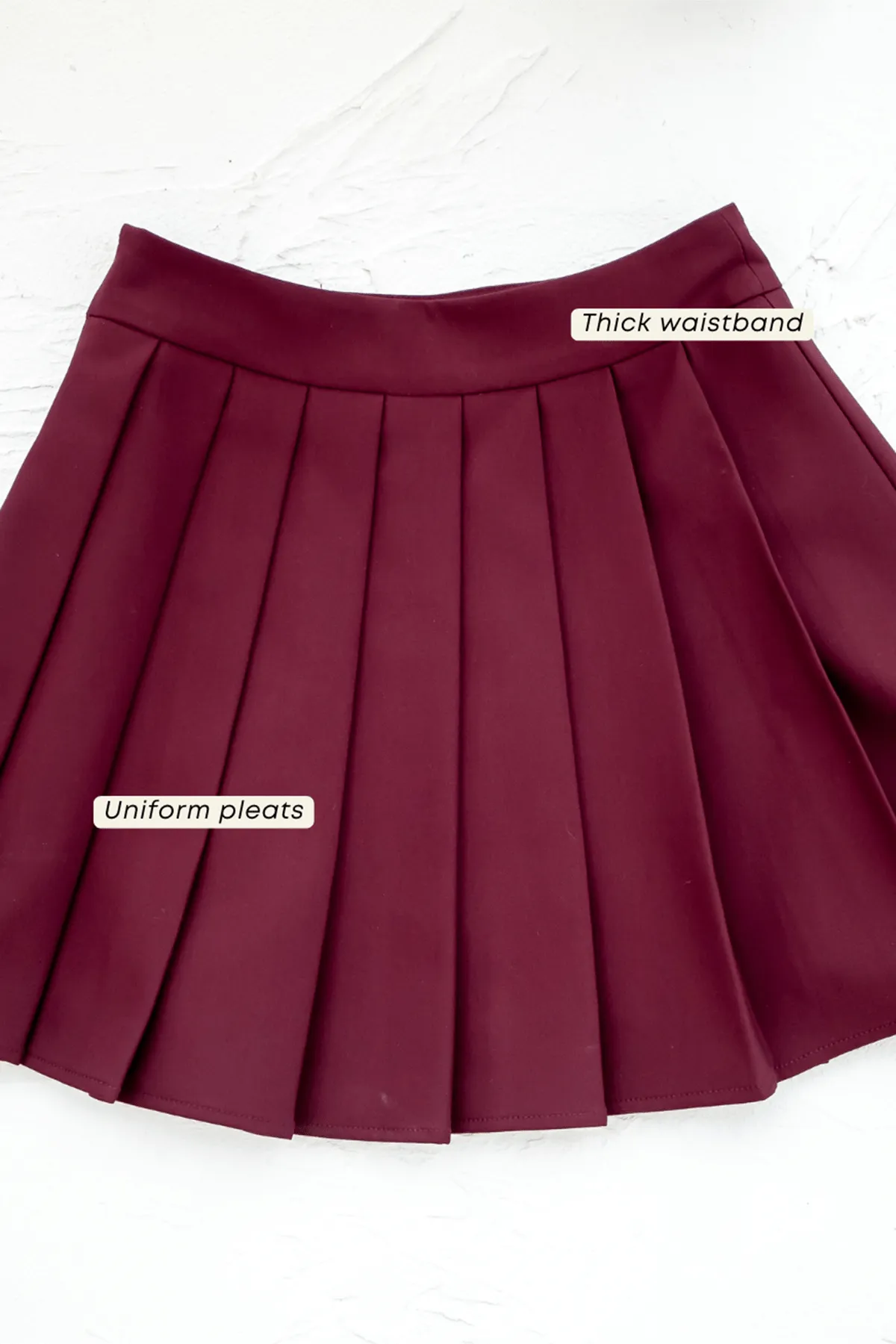 CAMU PLEATED SKIRT IN WINE