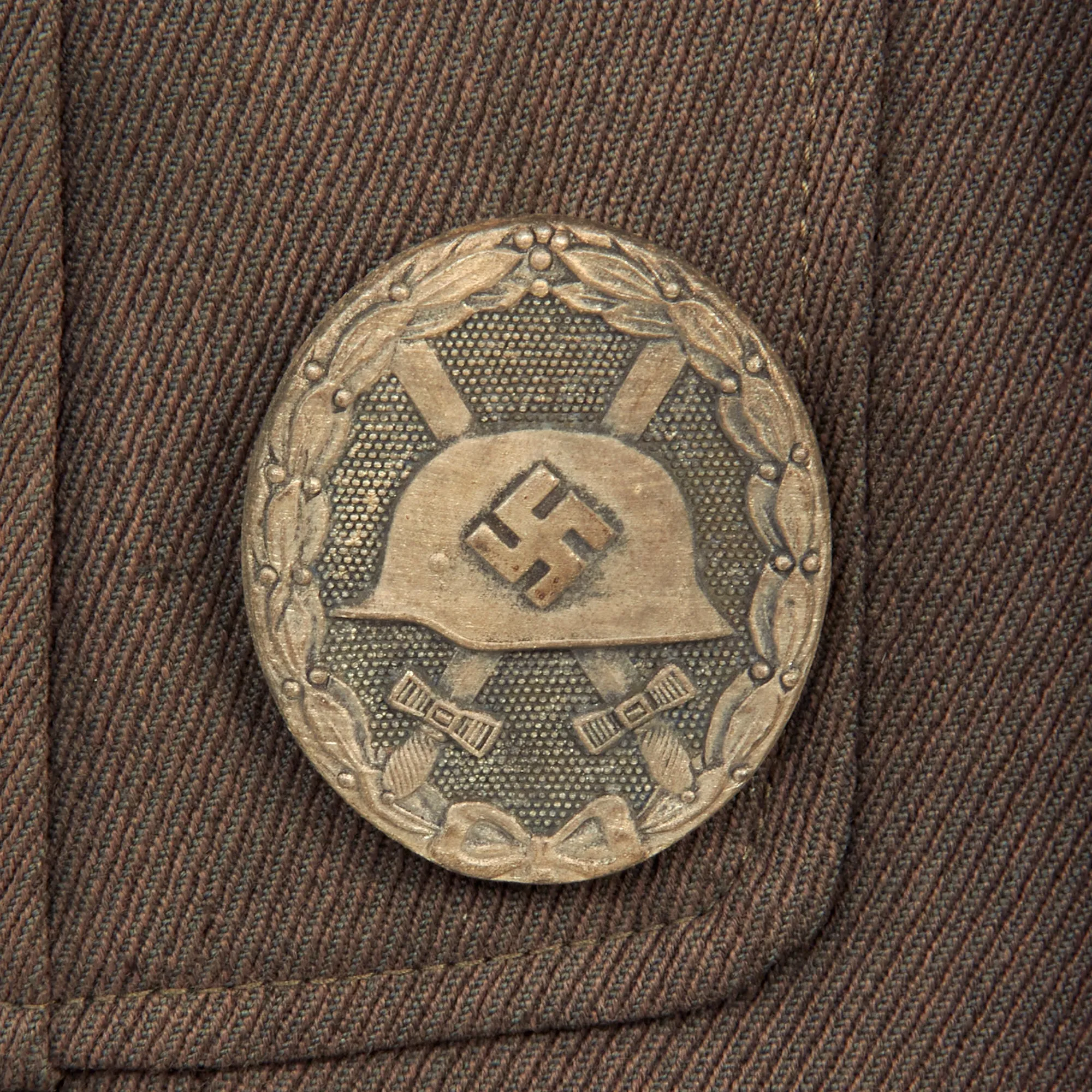 Original German WWII Heer Artillery Hauptmann Officer's M36 Field Tunic with Medal Bar, KVKI, and Silver Wound Badge