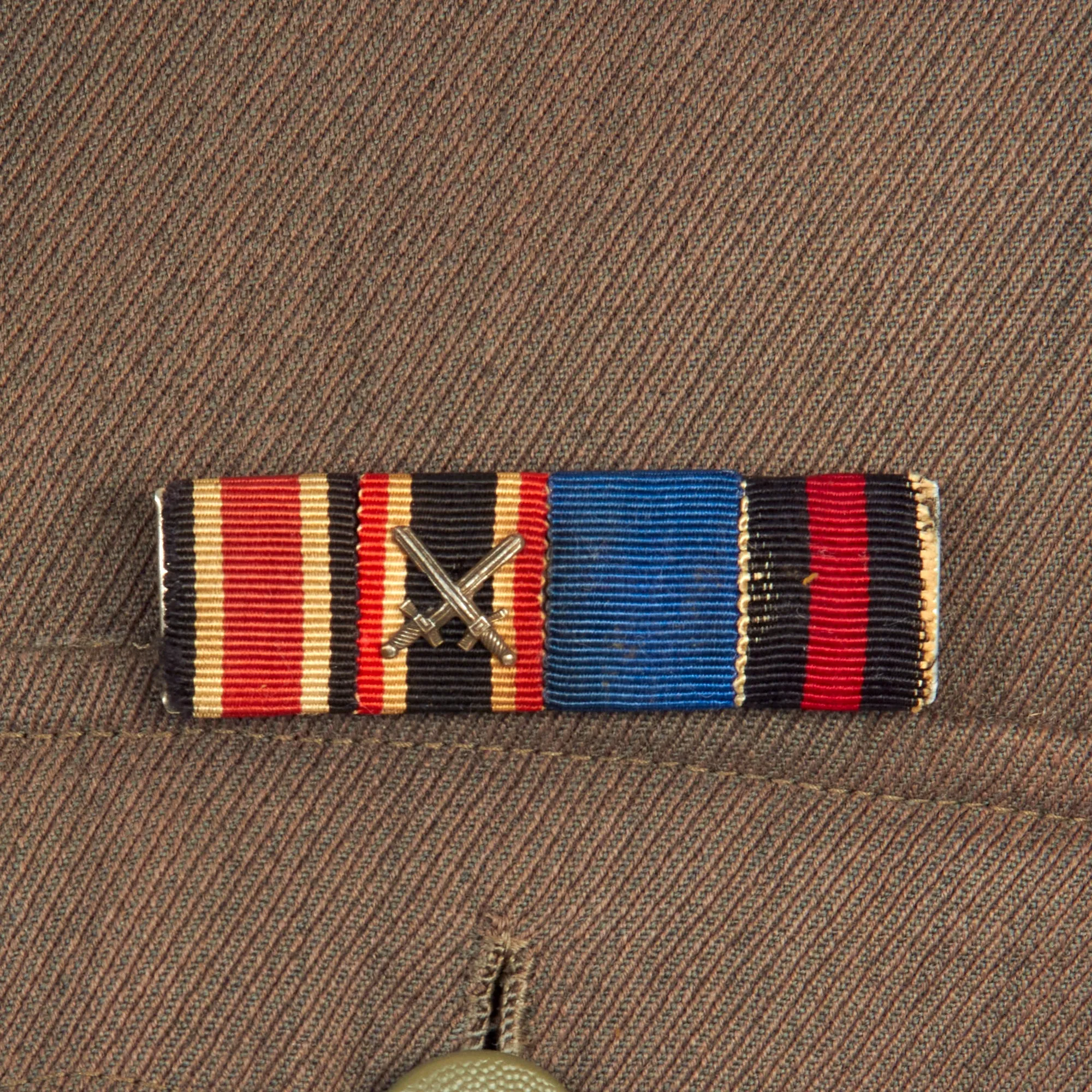 Original German WWII Heer Artillery Hauptmann Officer's M36 Field Tunic with Medal Bar, KVKI, and Silver Wound Badge