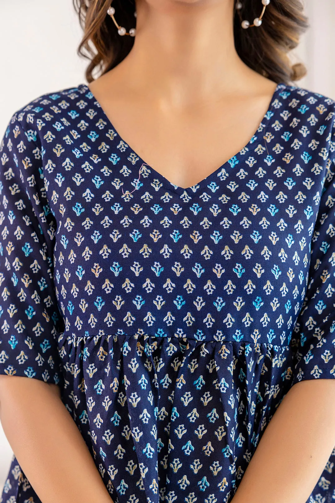 Women Navy Blue Printed V-Neck Peplum Tunic